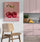 grande cuisine, mobilier rose, plante verte, fruit orange, affiche fruits décoratifs