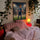 Framed personalized soccer poster above a bed in a cozy kids’ room