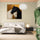 Rustic black and white horse wall art with a gold background, ideal for a bedroom with natural elegance
