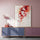 Elegant framed cherry blossom branch in red and white, ideal for a colorful modern living room