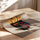 Poster Basquiat - Visage pop aux cheveux de frites en cuisine — Vierge - poster-enroullé