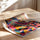 Poster Femme afghane - Regard voyageur aux couleurs vives — Vierge - poster-enroullé — passe-partout blanc
