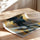 Poster Femme africaine de profil - Reine aux motifs ancestraux dorés — Vierge - poster-enroullé — passe-partout blanc