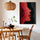 Contemporary abstract canvas with organic red shapes on black for living room decor