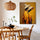 Modern living room with African women wall art, two women in straw hats and golden shawls, yellow-orange color scheme