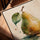 Pear watercolor wall art in a golden oak frame for living room decor