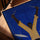 Drummer print in golden oak frame, minimalist electric blue background for modern interiors