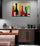 Colorful abstract bottles wall art above a modern kitchen countertop