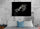 Lion and lioness wall art above a bed in a master bedroom