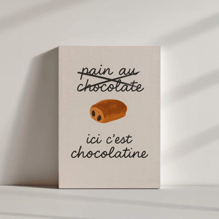Tableau humoristique de chocolatine sur fond blanc avec texte en style manuscrit, décoration ludique