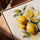 Watercolor lemon wall art in a golden oak frame for living room decor