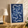 Deep blue abstract wall art with flowing, sinuous curves