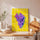 Modern wall art featuring purple, pink and yellow pop art grapes over a retro tile background