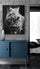 Wolf and pup wall art hanging above a blue cabinet in a hallway outside a bedroom