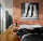 Contemporary photography print enhancing industrial bedroom decor — loft-style wall art