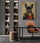Distinguished French Bulldog above a modern minimalist desk, office wall decor