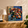 Whimsical flower-bicycle canvas above an oak sideboard, styled for a modern living room