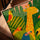 Canvas texture close-up of jungle wall art print with giraffe, panda and tropical birds