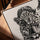 Black and white cheetah wall art for living room, framed in golden oak