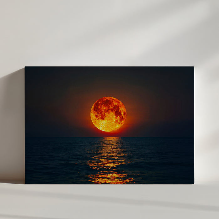Tableau grandiose lune rougeoyante et reflets sur océan pour une ambiance mystique et sereine