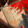 Japanese landscape wall art with mountains and a red sail, ideal for a Scandinavian office