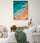 Beach wall art in a cozy master bedroom, creating a sense of escape