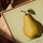 Yellow pear with green leaf art print for living room, golden oak frame