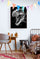 Kids' room decor with a black-and-white T-Rex poster, colorful garlands, and a cozy bed