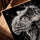 Black-and-white T-Rex skull wall art for a minimalist office