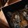 Orange tiger portrait with piercing eyes, living room wall art in a golden oak frame