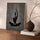 Tableau zen méditation yoga noir doré sur buffet moderne salon apaisant minimaliste
