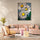Pop art daisy wall art with vibrant colors in a warm, modern living room