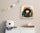 Kids bedroom wall art print of a child with smiling monsters