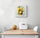 Small watercolor lemon painting of a cluster of yellow lemons hanging in a kitchen; juicy, glossy peel, bright transparent washes, drips add movement