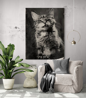 Poster hung above a white chair, surrounded by greenery. Concrete coffee table, providing a contemporary and soothing vibe.