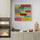 Minimalist light kitchen interior with "Bon Appetit" wall art as a focal point, adding dynamic vintage contrast