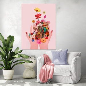 Artistic floral poster with hands holding colorful flowers on a pink background, cozy modern vibe