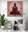 Zen Buddha canvas adding a splash of color to a minimalist living room