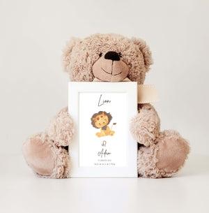 a child’s comfort toy holding personalized baby gifts