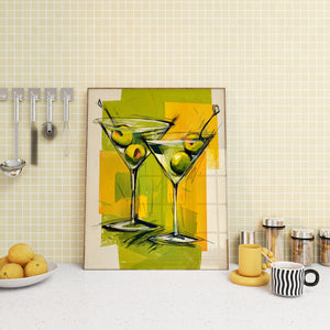 Tableau coloré représentant deux verres à martini avec olives vertes, idéal pour une décoration de cuisine conviviale.