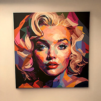Customer review: Marilyn Monroe wall art in multicolored geometric pop art, hanging on a beige wall, adding a vibrant, contemporary touch to the space.