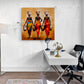Accroché dans un bureau, le tableau "Trois Femmes Africaines" inspire la créativité et l'évasion, apportant une touche artistique à l'environnement de travail.