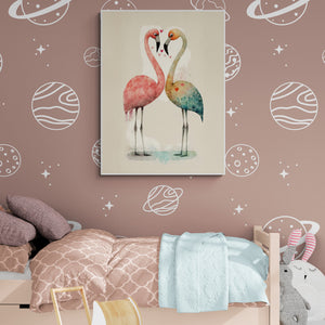 Stylized watercolor flamingos decorate a child's bedroom with pink walls adorned with celestial motifs. The bed features beige and turquoise tones with soft plush toys on the ground.