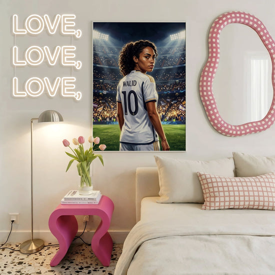 Framed personalized women’s soccer poster in an adult bedroom with pink and cream tones