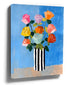 Naive art floral wall art of multicolored roses in a striped vase on a vibrant blue background
