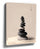 Minimalist Zen wall art with stacked stones on sand