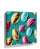 Colorful cocoa pods wall art in Nathalie Lété style, decorative wall print shown in a room setting