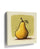 Yellow pear wall art print in room setting – playful kitchen wall decor
