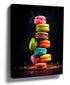 Colorful stacked macarons on black background canvas print wall art