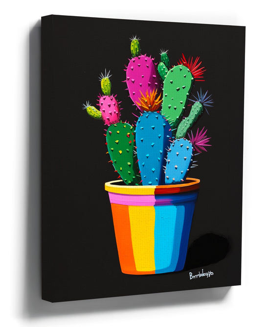 Cactus canvas wall art with a dynamic neon explosion, decorative wall art shown in a room setting